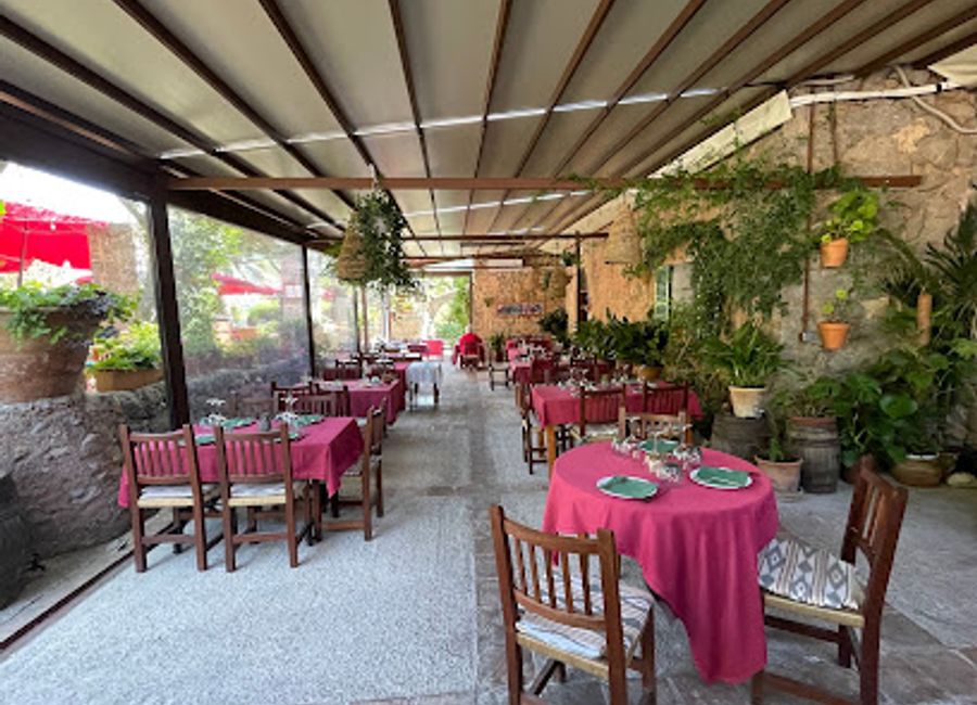 Experience the heart of Majorcan gastronomy at Restaurante Can Costa Valldemossa with breathtaking views and authentic flavors.