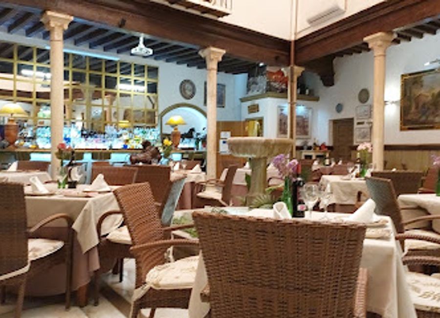 Experience authentic Andalusian flavors at Restaurante Pilar del Toro in Granada - where every dish tells a story.