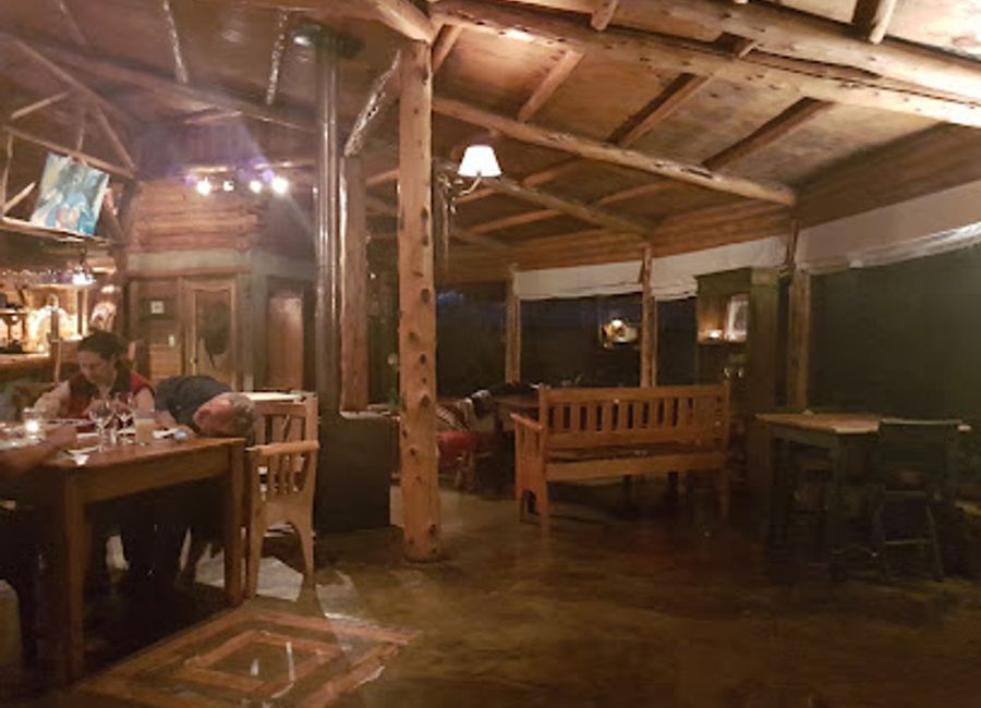 Discover authentic Chilean cuisine amidst breathtaking landscapes at Restaurante Martin Pescador in Futaleufú.