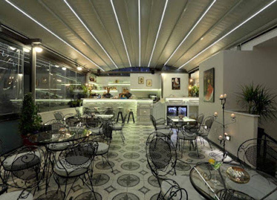 Experience exquisite Italian cuisine with breathtaking views at V1935 Roof Garden in Athens - your rooftop escape awaits.
