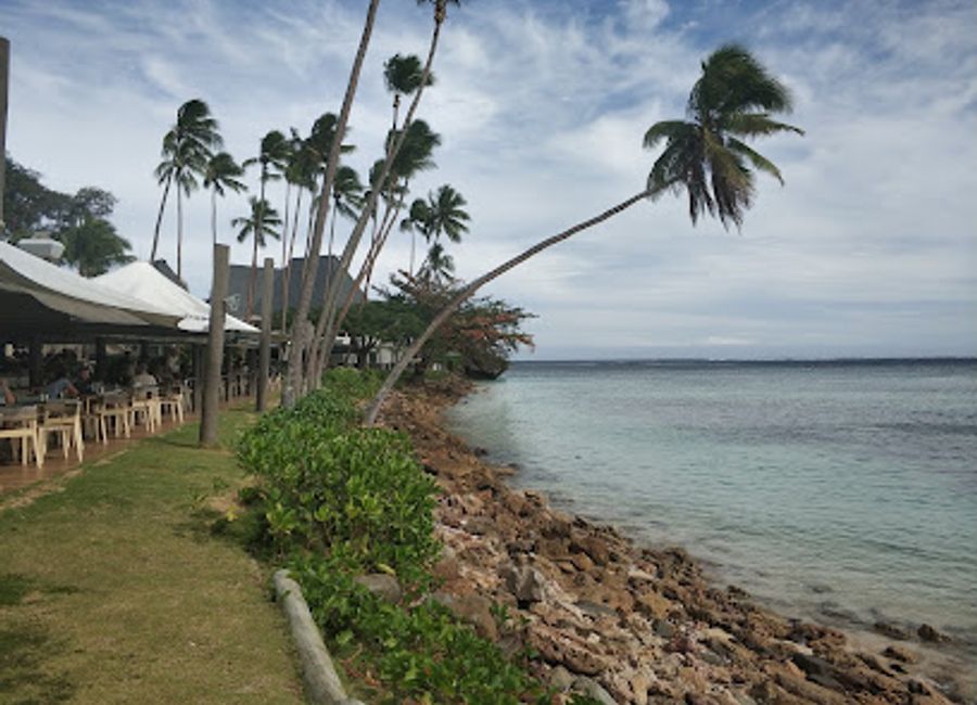 Experience culinary bliss at Beach Bar And Grill in Voua - savor local flavors amidst stunning ocean views and vibrant island vibes.