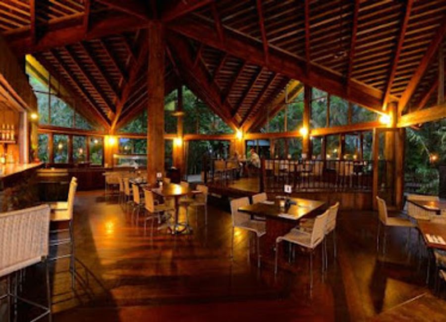 Discover exquisite local flavors amidst breathtaking rainforest views at The Cassowary Restaurant in Cape Tribulation.