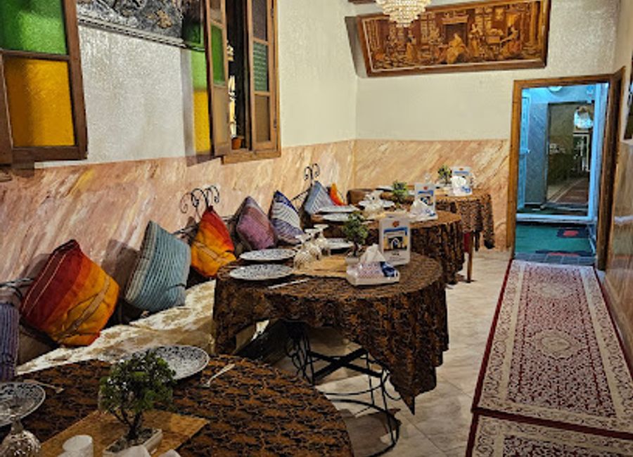 Experience authentic Moroccan flavors at Chez Hakim in Fès - a family-friendly restaurant serving delicious traditional cuisine.