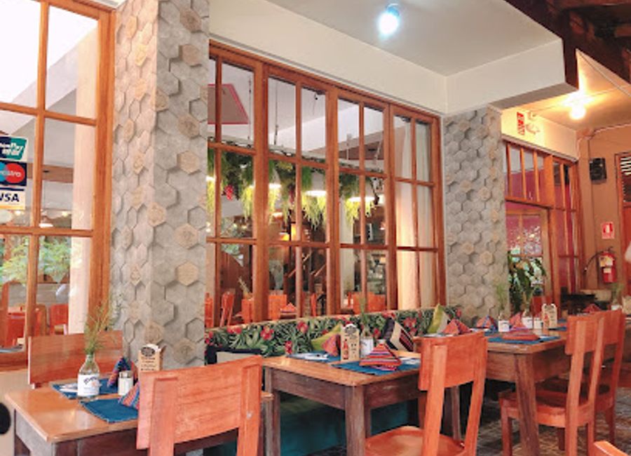 Experience authentic Peruvian cuisine and local craft beers at Chullos Restaurant & Craft Beer in Aguas Calientes.