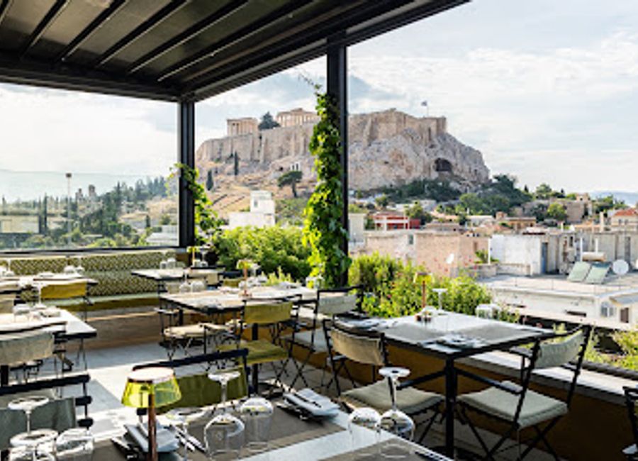 Experience breathtaking views and exquisite Mediterranean cuisine at SENSE Rooftop Restaurant in Athens - where fine dining meets spectacular skyline vistas.