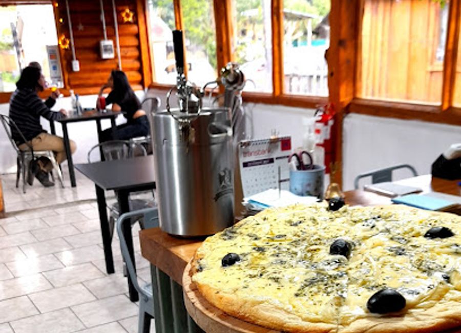 Discover La Rosadita in Futaleufú: where authentic Italian pizza meets breathtaking scenery in Los Lagos.