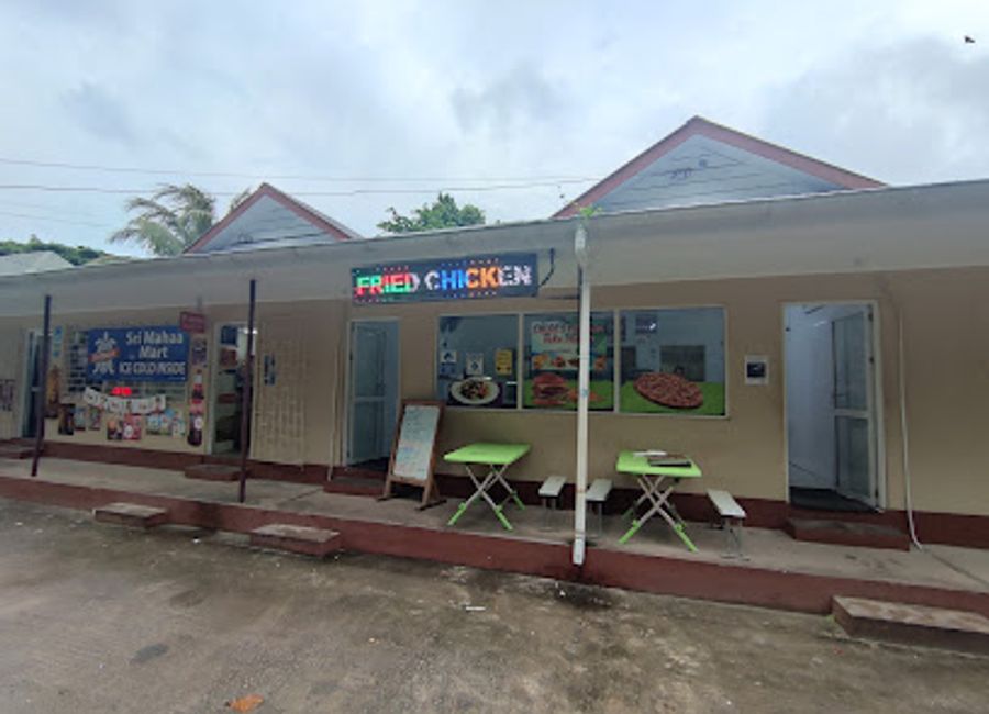 Discover delicious fried chicken and authentic Seychellois flavors at Barbaron Fried Chicken in Grand Anse Village.