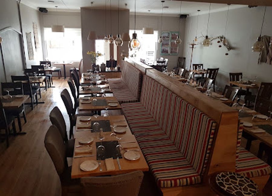 Experience the fusion of traditional Chilean cuisine and modern culinary artistry at Afrigonia in Puerto Natales.