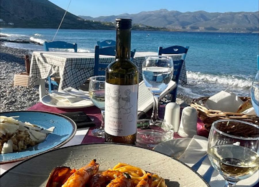 Experience authentic Greek cuisine at Taverna Asterias in Gefira - where flavor meets stunning views.