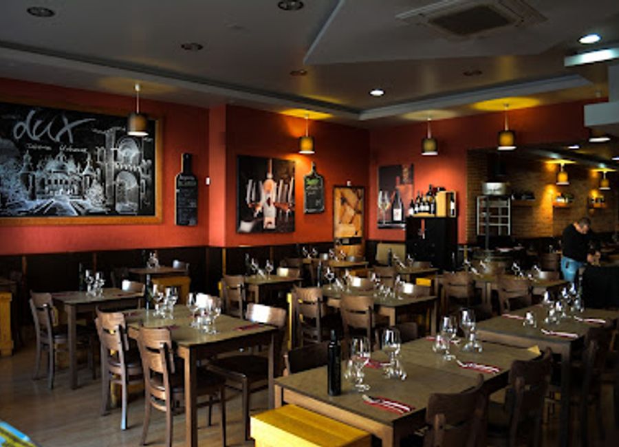 Discover authentic Portuguese flavors at Dux Taberna Urbana in Coimbra—a delightful blend of tradition and modernity awaits!