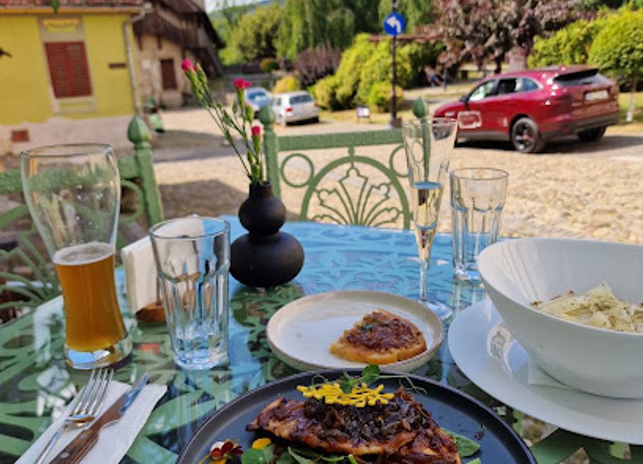 Experience authentic Romanian cuisine at Geurgius Krauss Restaurant in Sighișoara, where tradition meets flavor in a cozy atmosphere.
