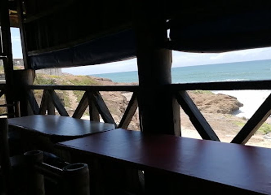 Discover delicious local cuisine and breathtaking ocean views at Castle Beach Restaurant in Cape Coast.