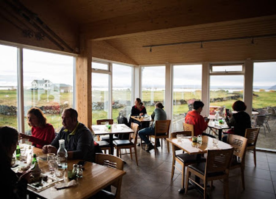 Experience authentic Icelandic cuisine and warm hospitality at Vogafjós Farm Resort near Myvatn Lake.