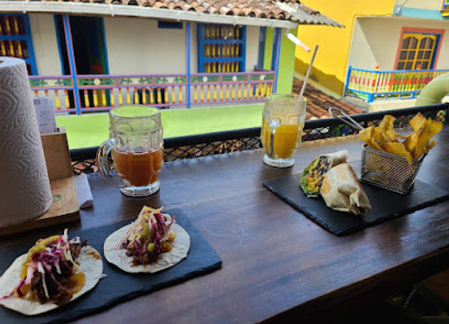 Experience authentic Colombian cuisine at El Bacchanal in Guatapé - where every meal tells a story.