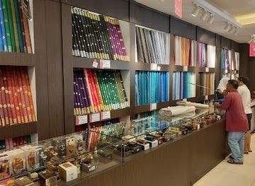 brunei/tutong-river/shop/al-bukhari-textile-brunei