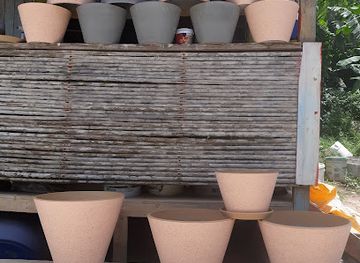 grenada/black-bay-beach/shop/jus-pots-production