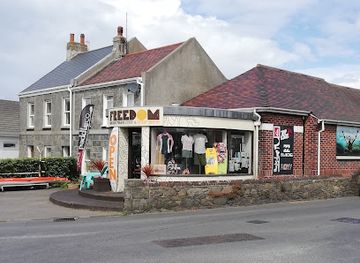 guernsey/rousse-tower/shop/freedom-surf