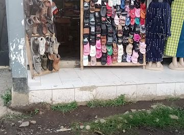 tanzania/masai-steppe/shop/shoes-shop-cloth-masai-creative-collection