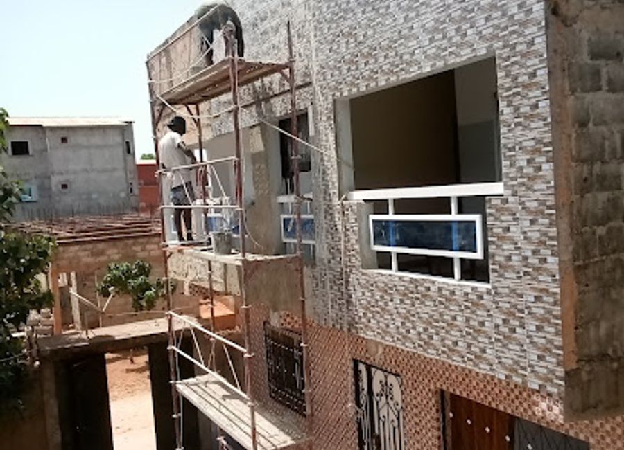 Discover unique women's fashion at Khalifa VIP Shop in Ziguinchor's vibrant Marché tiléne, where style meets local craftsmanship.