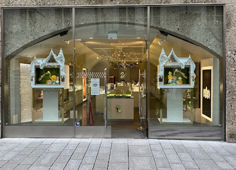 Explore the exquisite Swarovski Store in Salzburg's Getreidegasse, showcasing stunning jewelry and crystal creations in a historic setting.