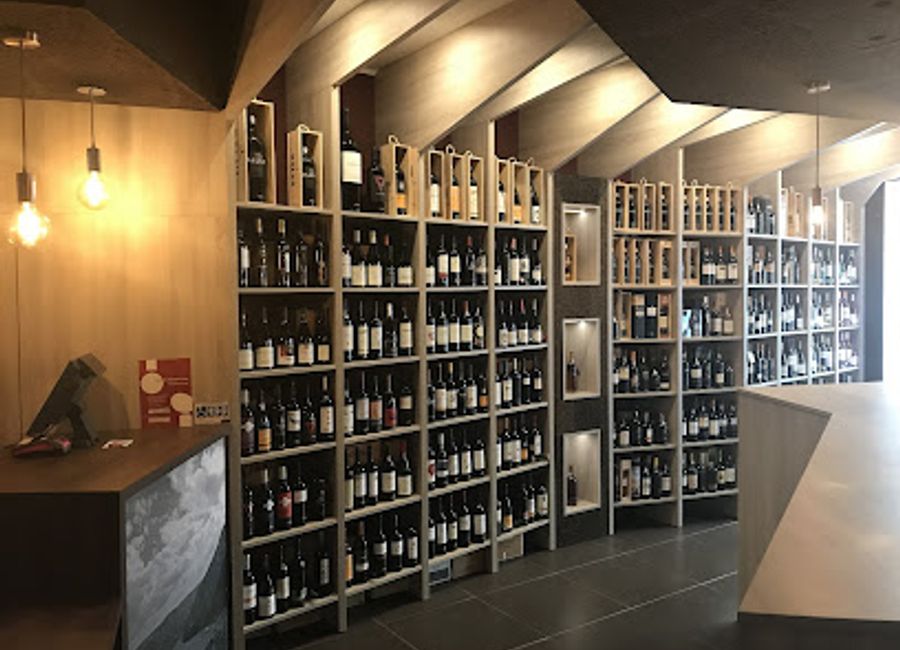 Experience the heart of Portuguese winemaking at Time By Wine, a charming store and bar in scenic Pinhão, offering exquisite tastings and local delicacies.
