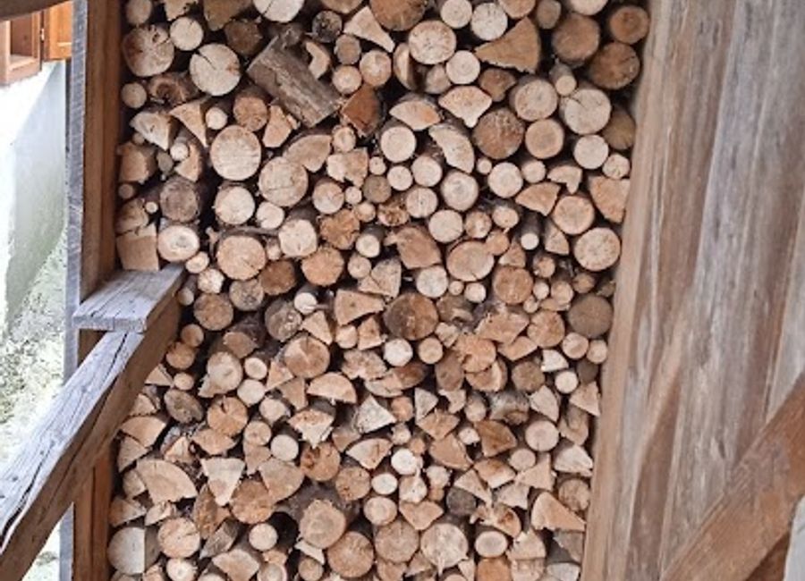 Discover unique handcrafted treasures at Arte del Bosco, a charming craft store in the heart of Falcade, Italy, reflecting local artistry and tradition.