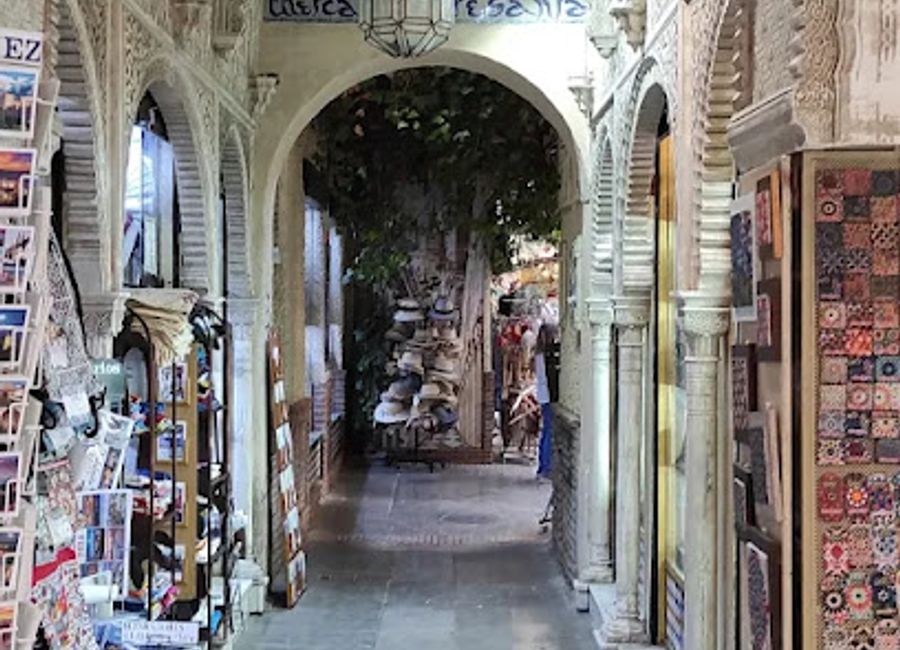 Explore Alcaicería, Granada's vibrant market of unique handicrafts, religious goods, and enchanting miniatures, rich in history and culture.