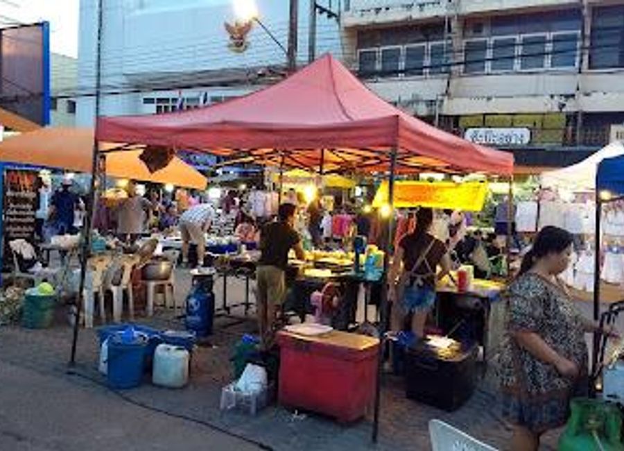 Experience the vibrant atmosphere of San Kamphaeng Saturday Walking Street, a local market bursting with crafts, food, and culture in Chiang Mai, Thailand.