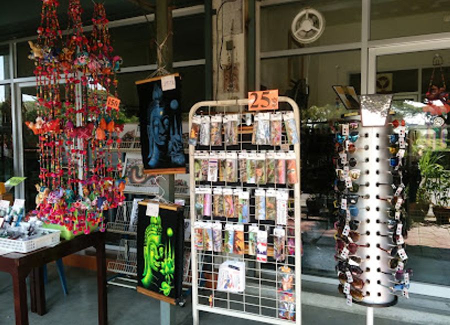 Discover unique handcrafted treasures at the charming souvenir shop in the heart of Kanchanaburi, perfect for capturing memories of your Thai adventure.