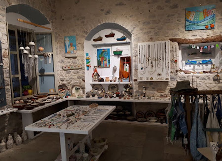 Discover unique souvenirs and local crafts at Riza Gift Shop in Kardamyli, where timeless Greek artistry meets warm hospitality.