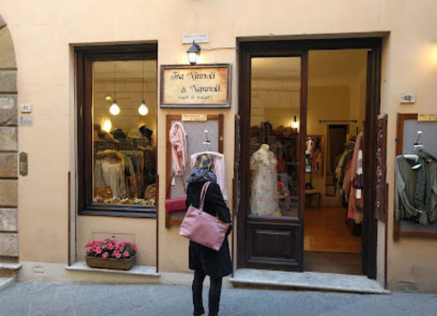 Explore Tra Ninnoli & Nannoli, Montepulciano's chic women's fashion store, featuring stylish clothing and accessories that embody Italian elegance.