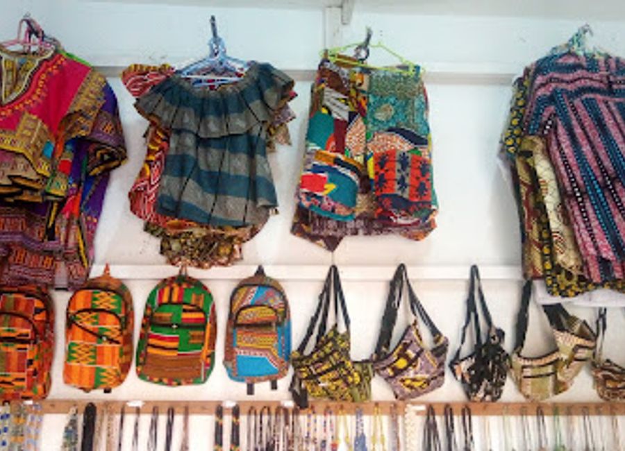 Discover unique Ghanaian crafts at Seaside Souvenirs Shop, where art meets culture in the heart of Elmina.