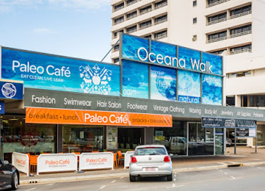 Explore the vibrant Oceana Walk Arcade in Cairns - a shopping haven with unique boutiques, delightful eateries, and a lively atmosphere.