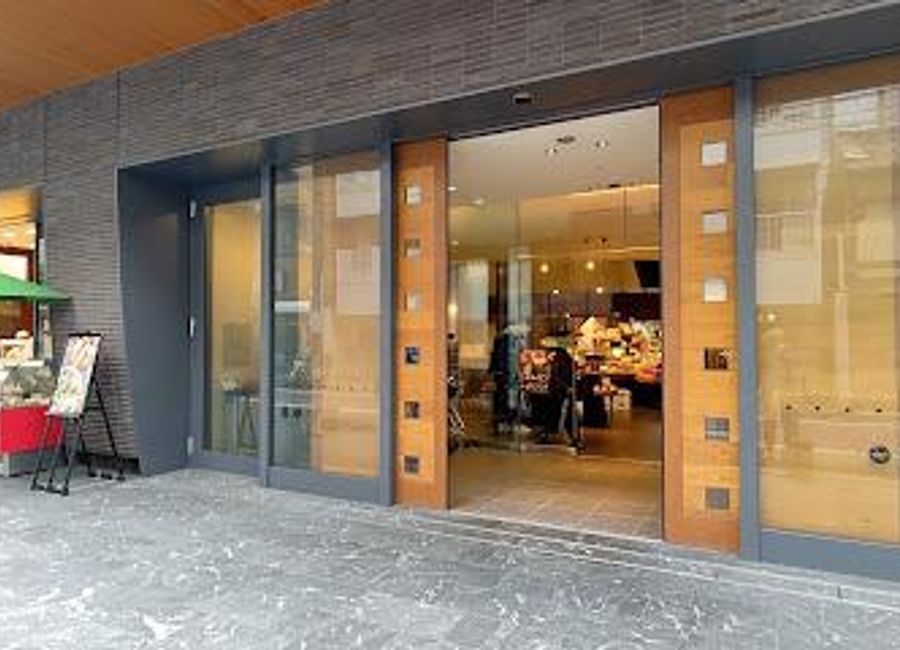 Discover the rich culinary heritage of Kyoto at Yaoichi Honkan, a vibrant grocery store offering local produce and unique snacks.