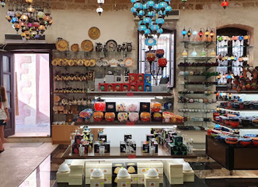 Explore the Temple Gift Shop: A treasure trove of handmade souvenirs and stunning mosaic lamps in the heart of Chania, Crete.