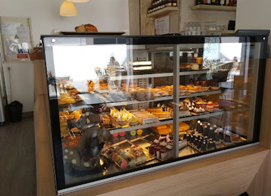 Discover the sweet flavors of Portugal at Segredos Da Terra Cotovia, a charming pastry shop in Cotovia offering delightful and fresh pastries.