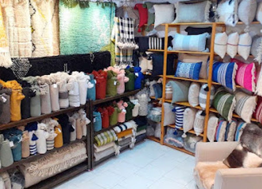 Explore the rich heritage of Moroccan craftsmanship at the Moroccan Craft Concept Store, home to exquisite handwoven rugs and unique artisanal treasures.