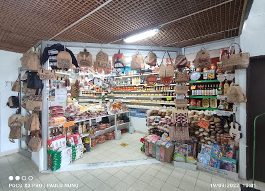 Explore the vibrant produce market of Sabugueiro in Alvoco da Serra, where local flavors and fresh ingredients come together in a delightful atmosphere.