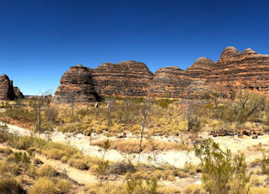 Explore the breathtaking landscapes of Purnululu National Park at Bungle Bungle Caravan Park & Tour Company, offering adventure and relaxation in harmony.