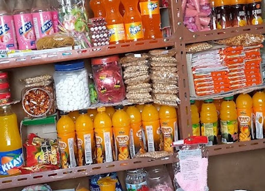 Experience the vibrant culture of Harar at Hilina Shop, your destination for unique local crafts and delicious traditional snacks.
