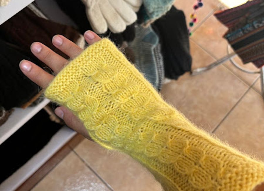 Explore authentic Peruvian textiles at Artesanias Intichay in Pisac, where vibrant craftsmanship meets rich cultural heritage.