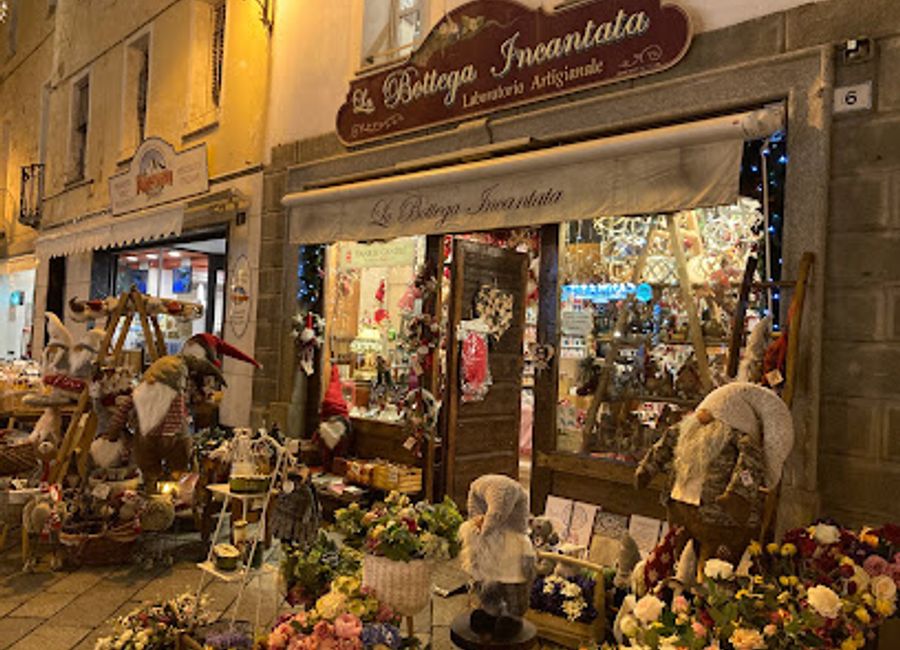 Explore La Bottega Incantata in Aosta for a curated selection of antiques, linens, novelties, and perfumes, perfect for unique souvenirs.