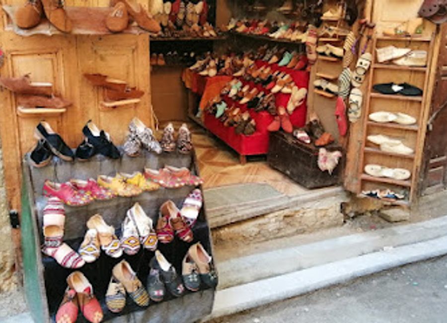 Explore Art Fez in Fes El Bali for unique gifts and handcrafted shoes that embody Moroccan artistry and culture.