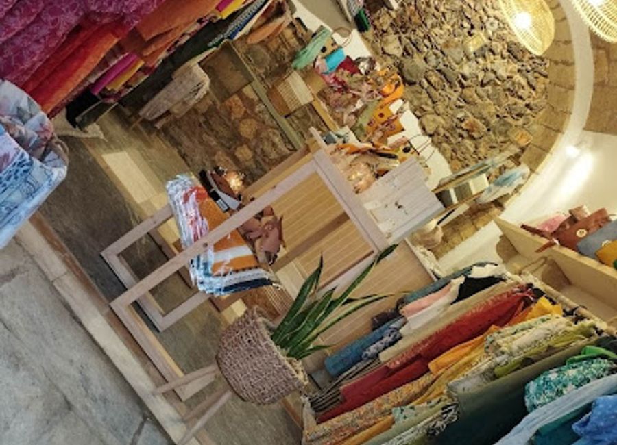 Explore the charm of Pietra Boutique in Monemvasia, Greece, where style meets tradition in a beautifully curated clothing store.
