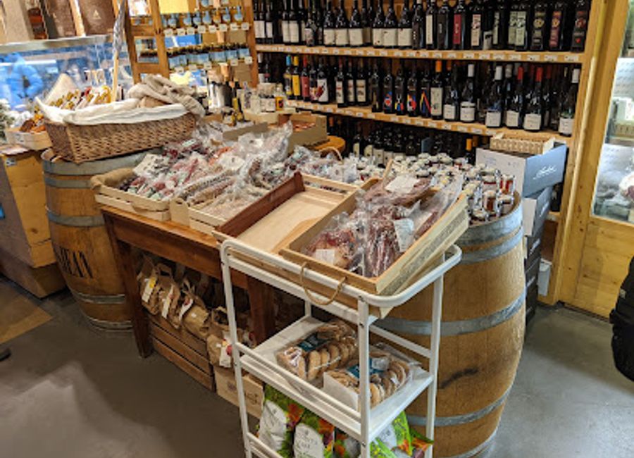 Discover the rich flavors of Aosta Valley at Antica Latteria Erbavoglio, a premier cheese and wine shop offering artisanal delights.