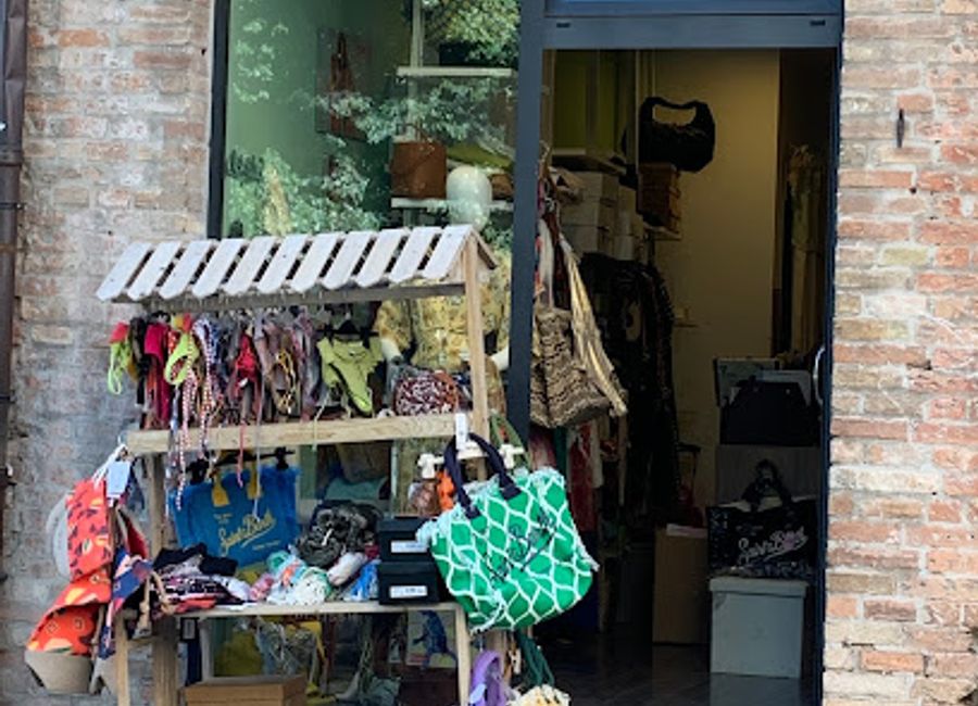 Explore unique Italian fashion at Mon Petit Monde, a charming clothing store in the historic city of Urbino, perfect for stylish souvenirs.