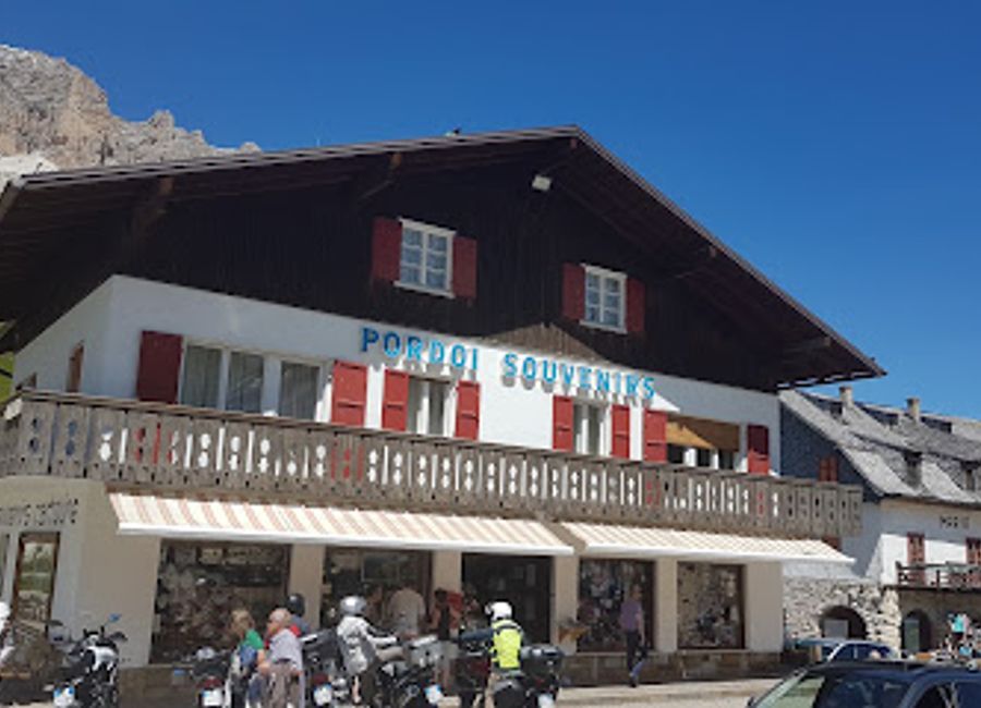 Discover unique gifts and local crafts at Pordoi Souvenirs in the breathtaking Dolomites, perfect for capturing your alpine adventure.