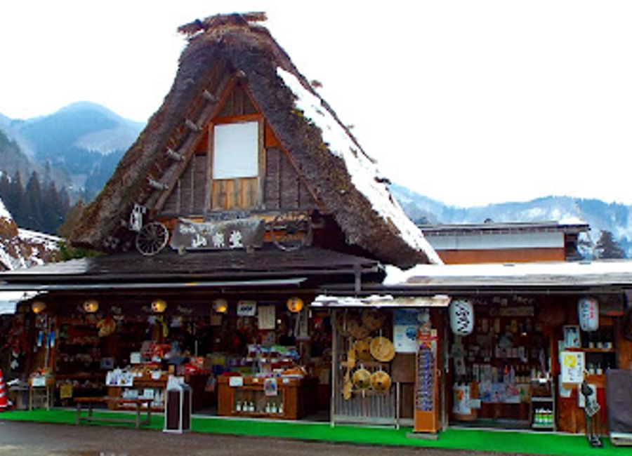 Discover the essence of Japan at Sanrakudo, a charming souvenir store in Shirakawa-go offering handcrafted treasures and local delicacies.