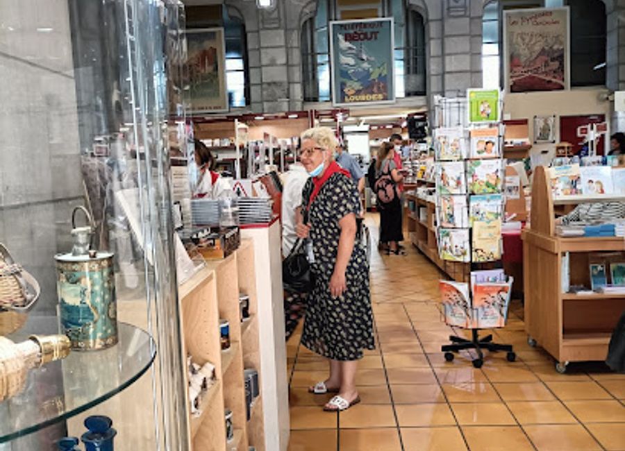 Explore the Librairie de la Grotte in Lourdes, a spiritual haven offering an extensive selection of religious books and artifacts for every pilgrim.